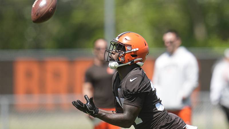 Cleveland Browns' Jerome Ford catches the ball on a a kickoff during an NFL football practice,...