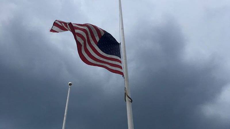 Flags were ordered to half staff.