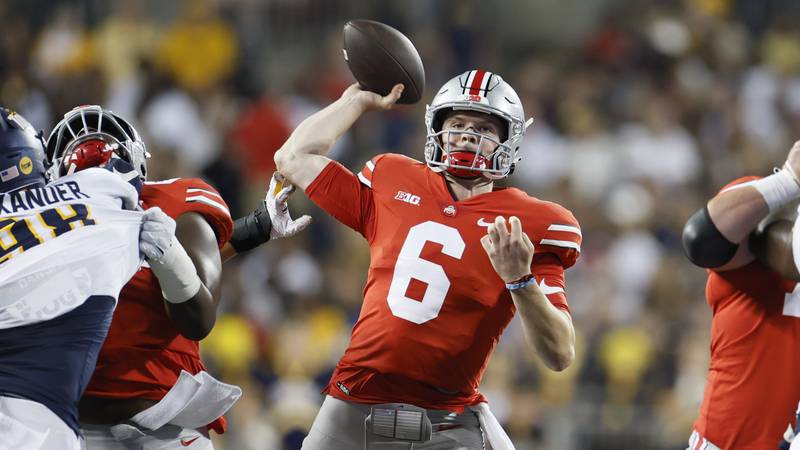FILE - Ohio State's Kyle McCord plays against Toledo during an NCAA college football game...