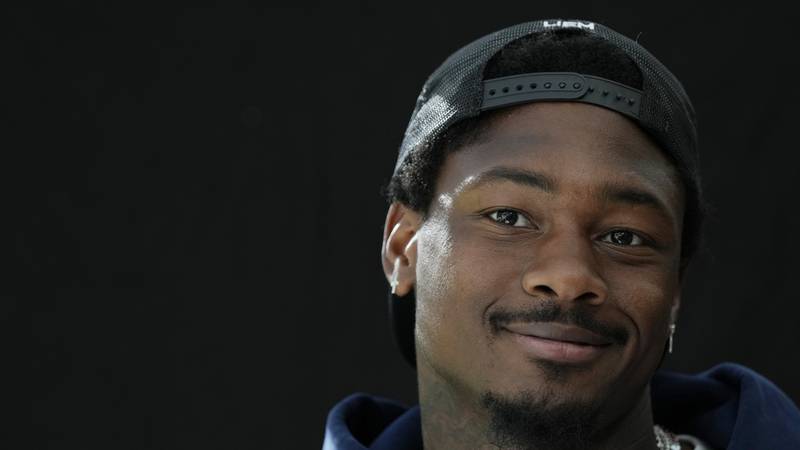 Buffalo Bills wide receiver Stefon Diggs speaks with media after a practice session in Watford,...