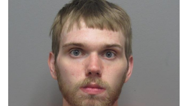 Michael Hughes, of Parma, is accused of hitting a victim in the head with a rifle while...
